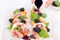 Peach and Prosciutto Caprese Salad with Burrata and Basil