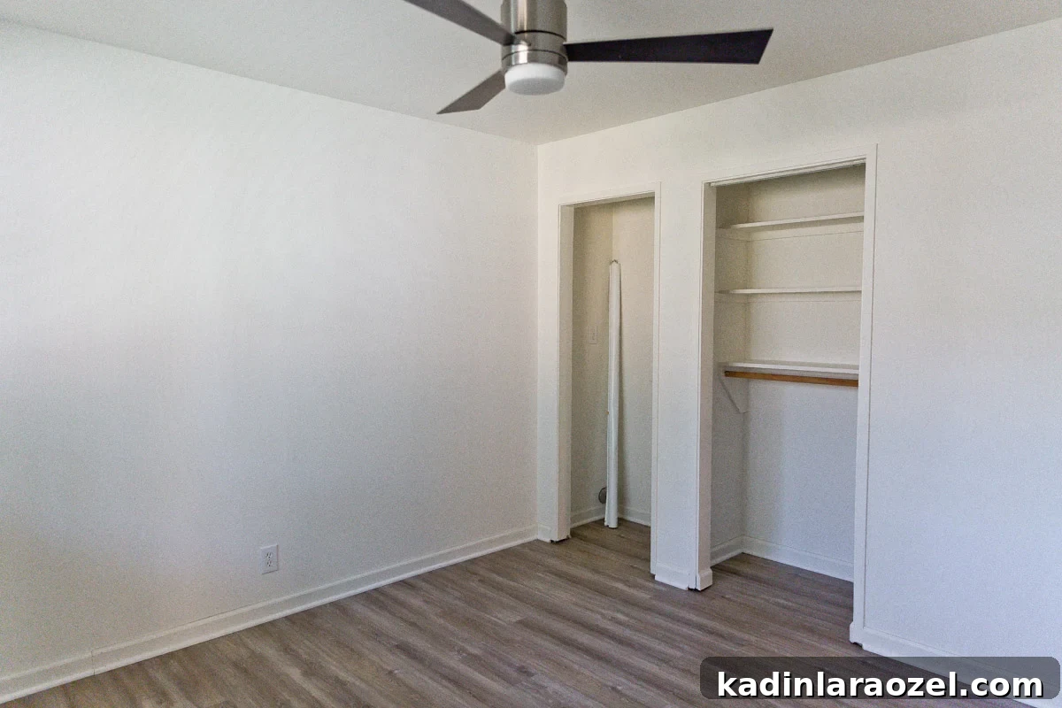 Guest Bedroom Closet Desk Makeover: DIY Small-Space Workstation 5 empty bedroom with two small closets and no closet doors