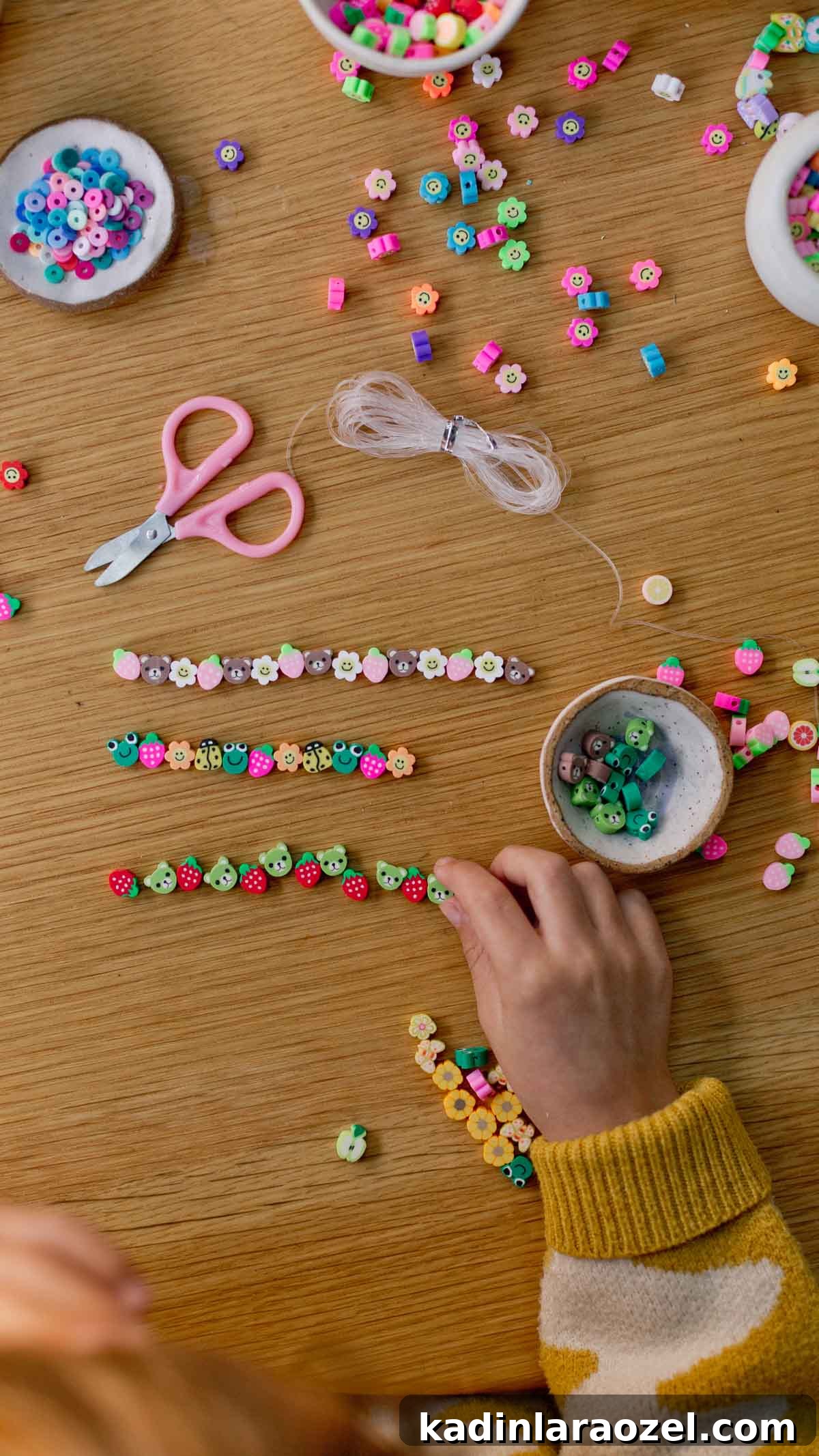 Creative Clay Bead Bracelet Designs and Styling Ideas 8 child designing beaded bracelets at a table surface