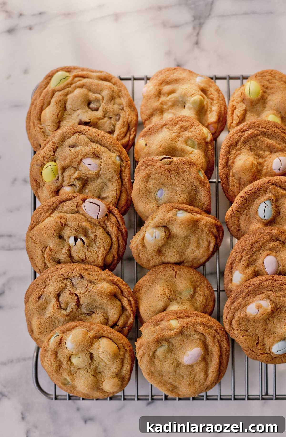 Cadbury Chocolate Chip Cookie Recipe — Chewy, Chocolatey Treats 5 Easter candy cookies on a cooling rack
