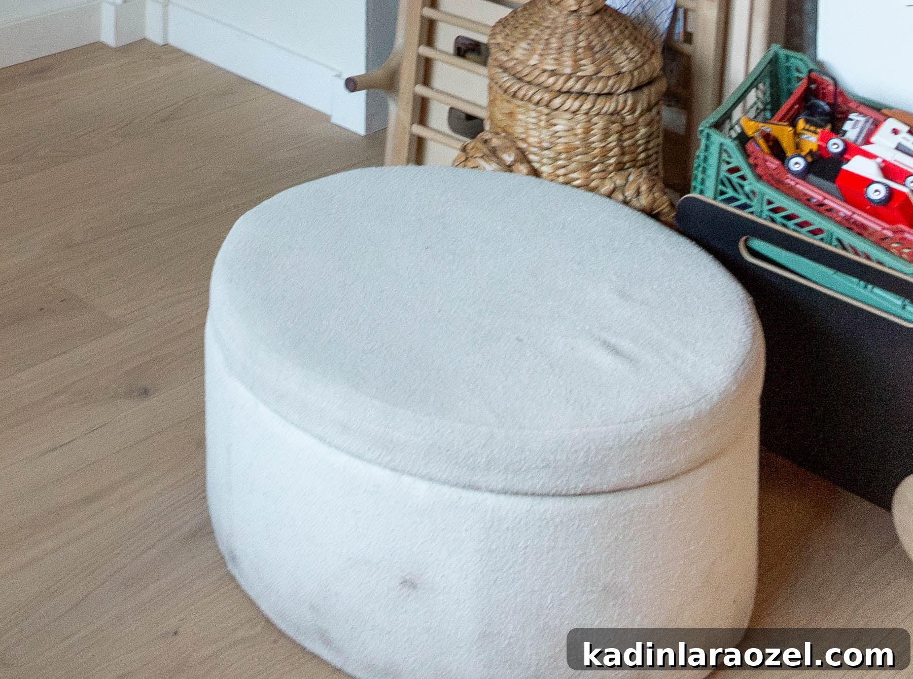 before photo of old round ottoman in dirty fabric