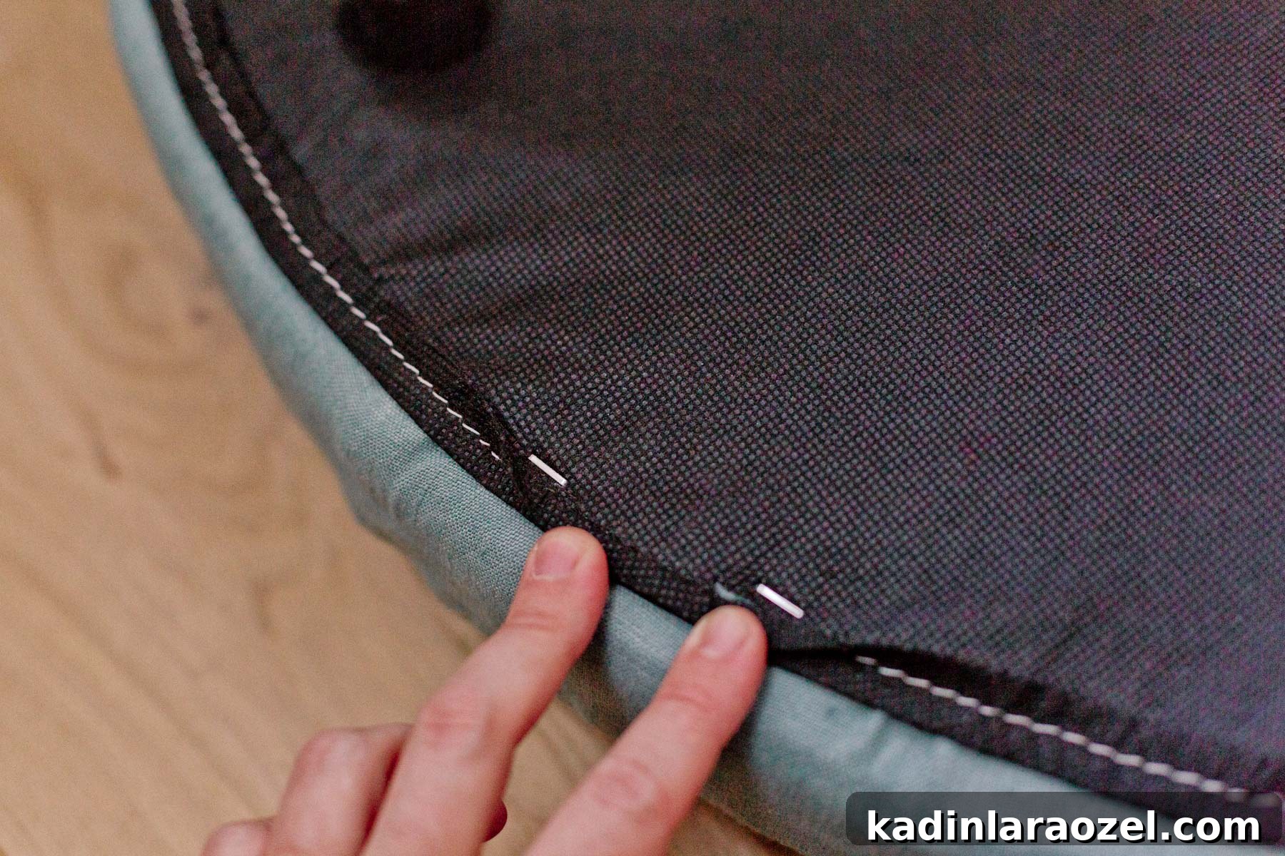underside of the round ottoman lid