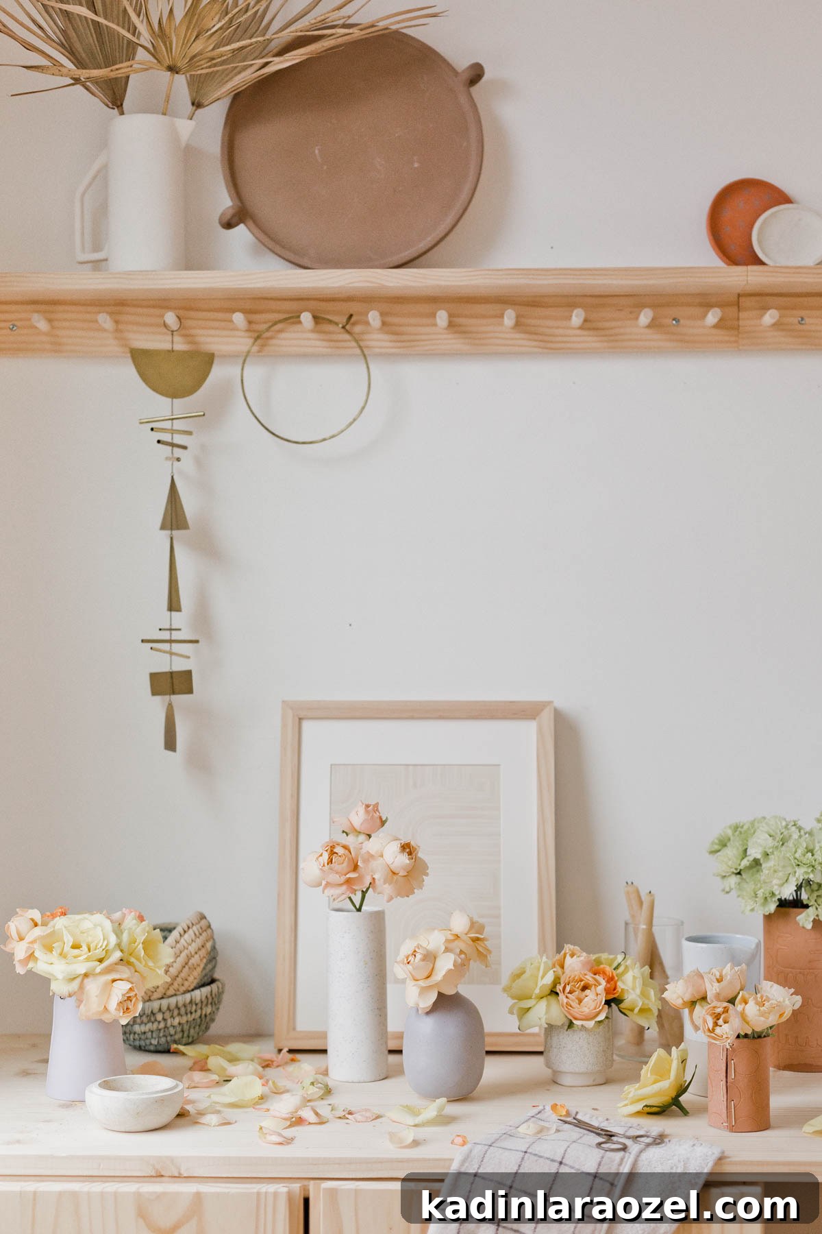 Instant Ways to Upgrade Grocery Store Flowers for Stunning Bouquets 9 flowers sitting on a minimal modern desk space in well lit home