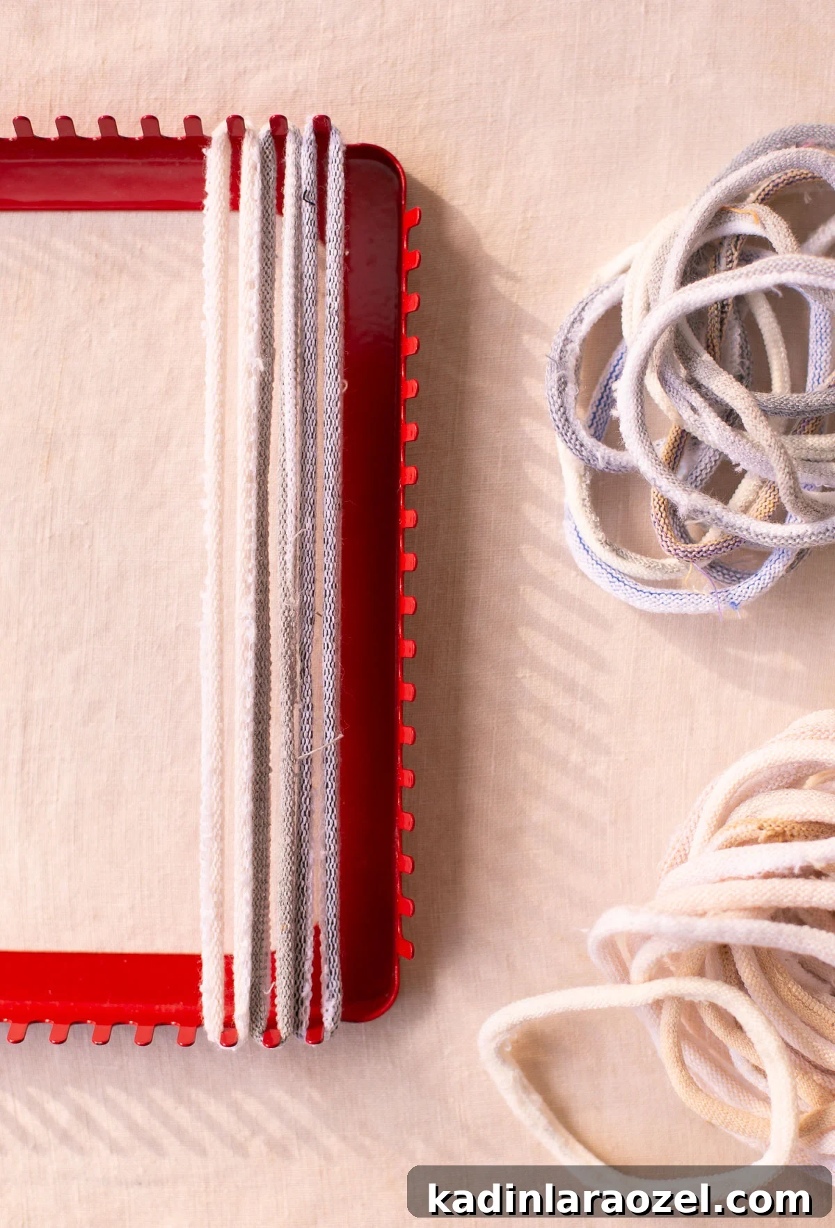 stringing a potholder loom with loppers