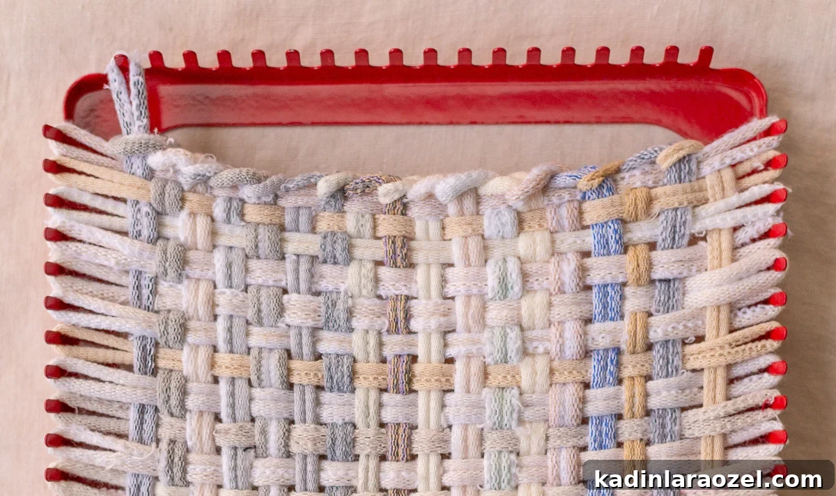 removing weaving from potholder loom