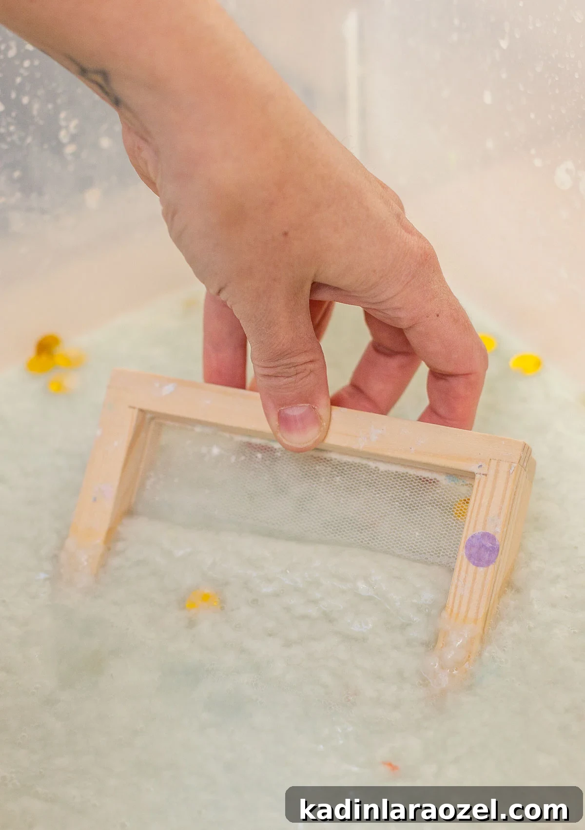 making paper with paper mould screen and paper pulp