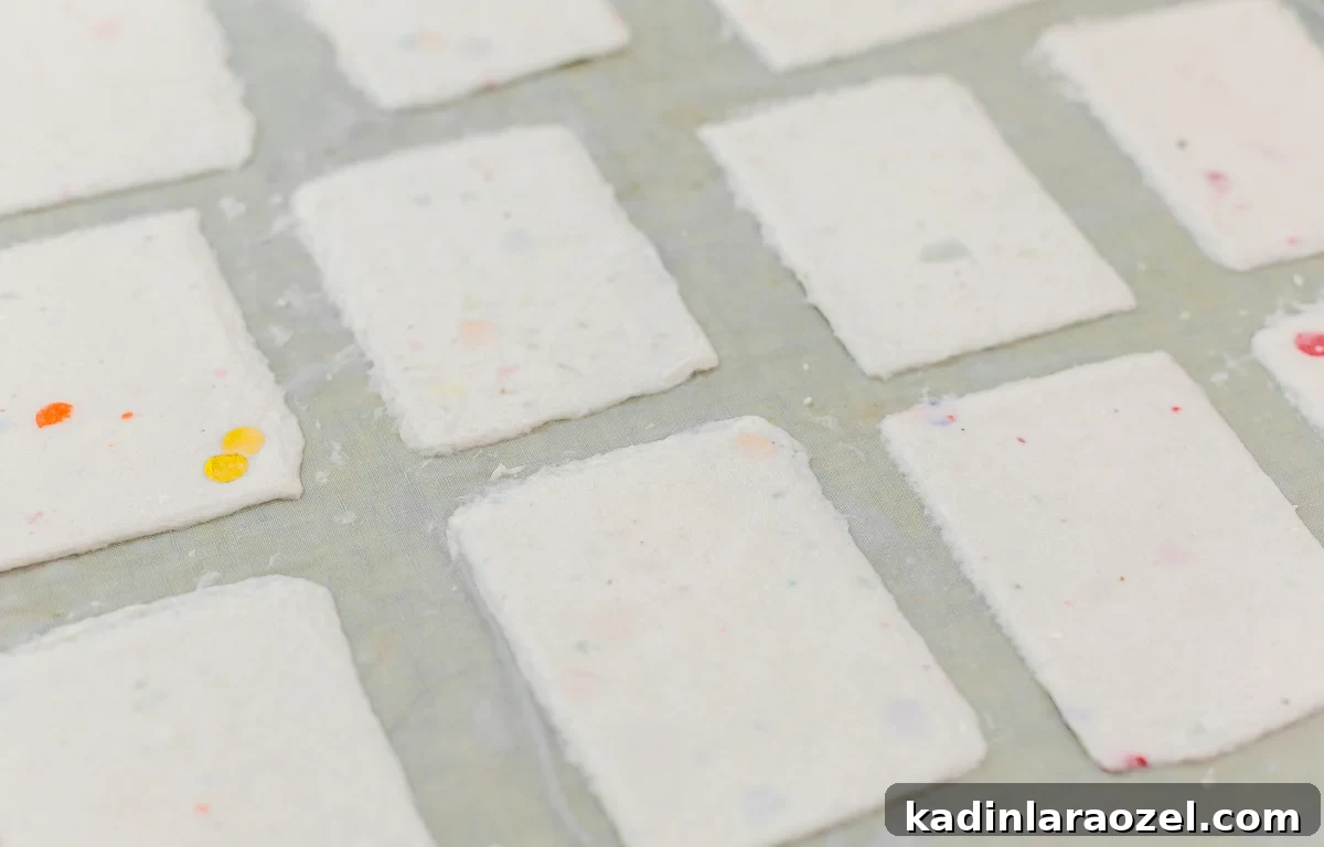 homemade paper laid out to dry on a towel