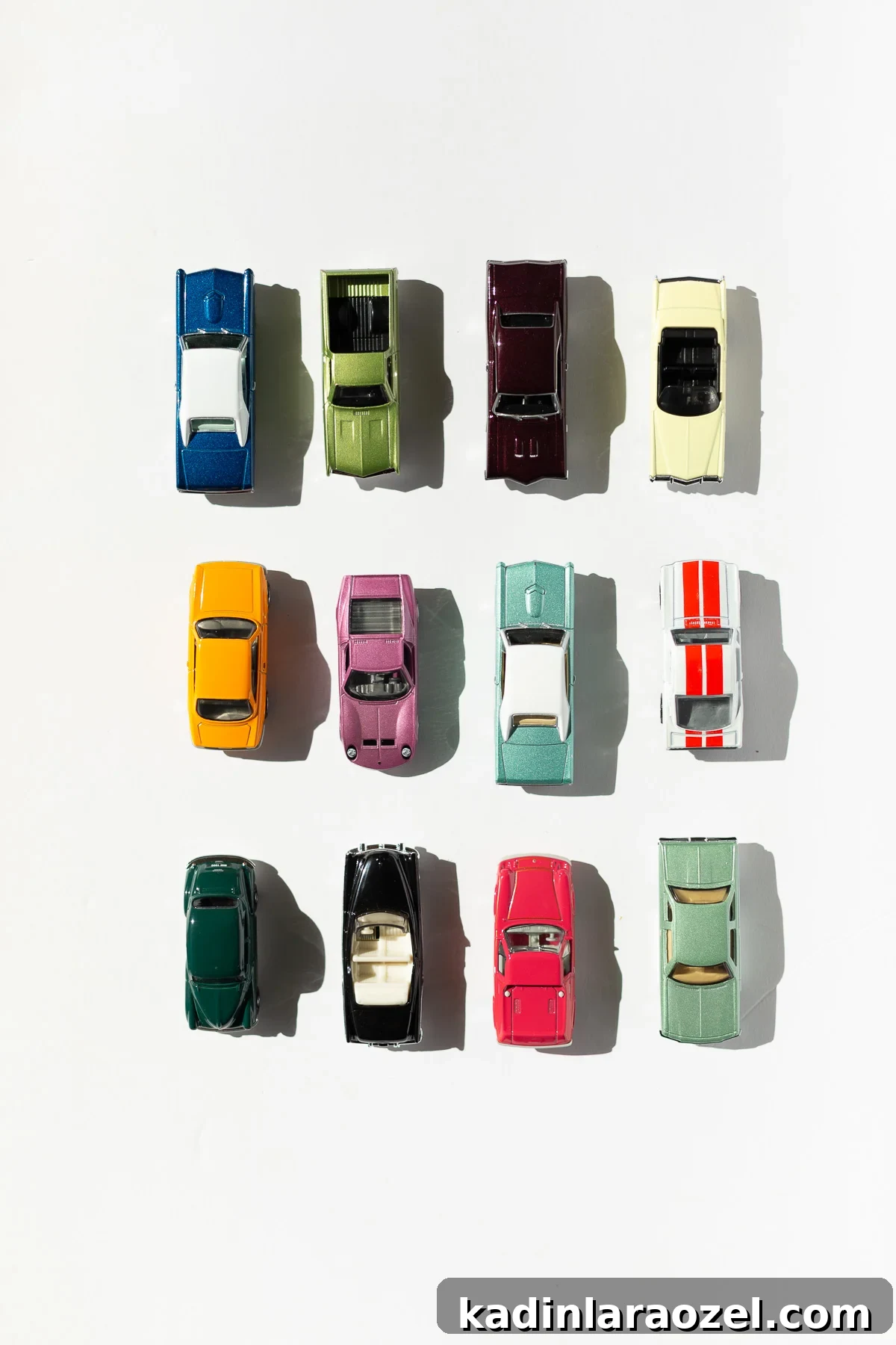 DIY Car-Themed Valentine Crafts for Kids: Vroom Vroom Ideas 2 metal toy cars lined up in straight rows, various colors