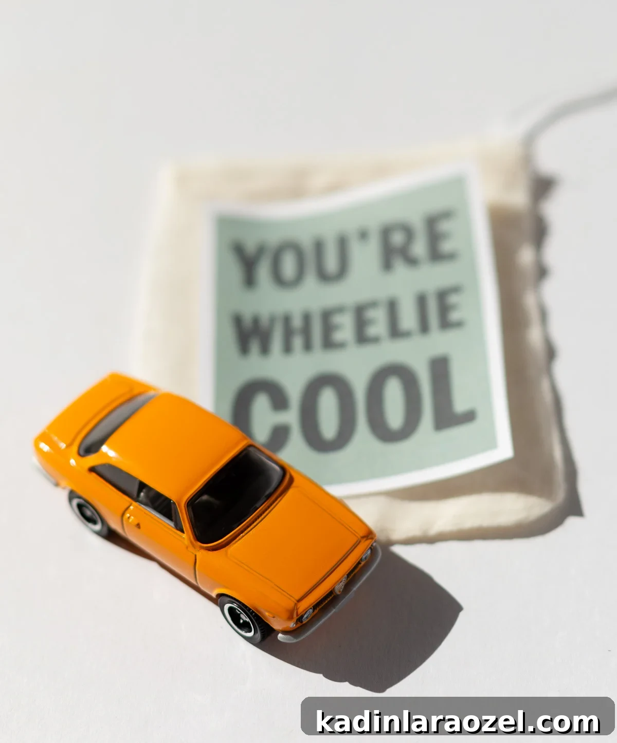DIY Car-Themed Valentine Crafts for Kids: Vroom Vroom Ideas 6 orange toy car with message that say 'you're wheelie cool'