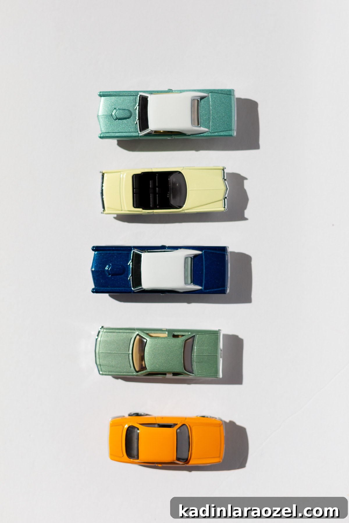 DIY Car-Themed Valentine Crafts for Kids: Vroom Vroom Ideas 9 toy cars lined up on white background