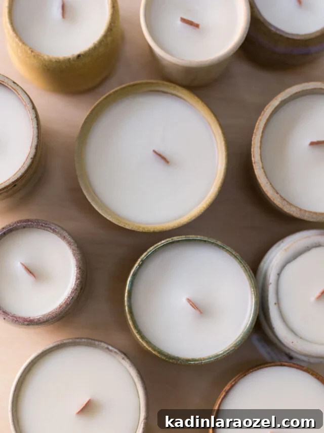 homemade candles in earth tones ceramic vessels photographed overhead