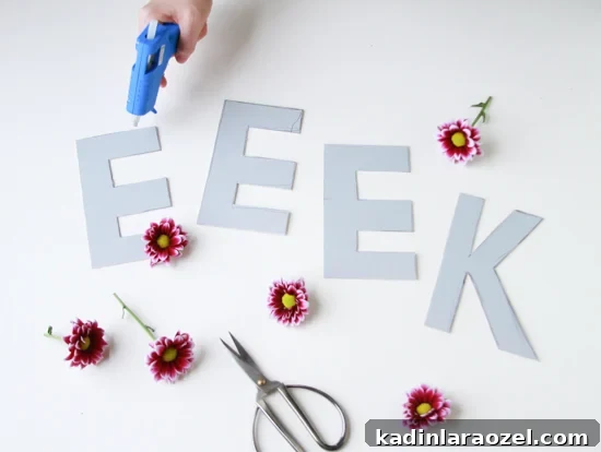making a flower halloween decoration with burgundy mums and cardboard