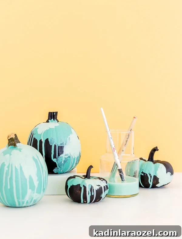watercolor painted halloween pumpkins with yellow background
