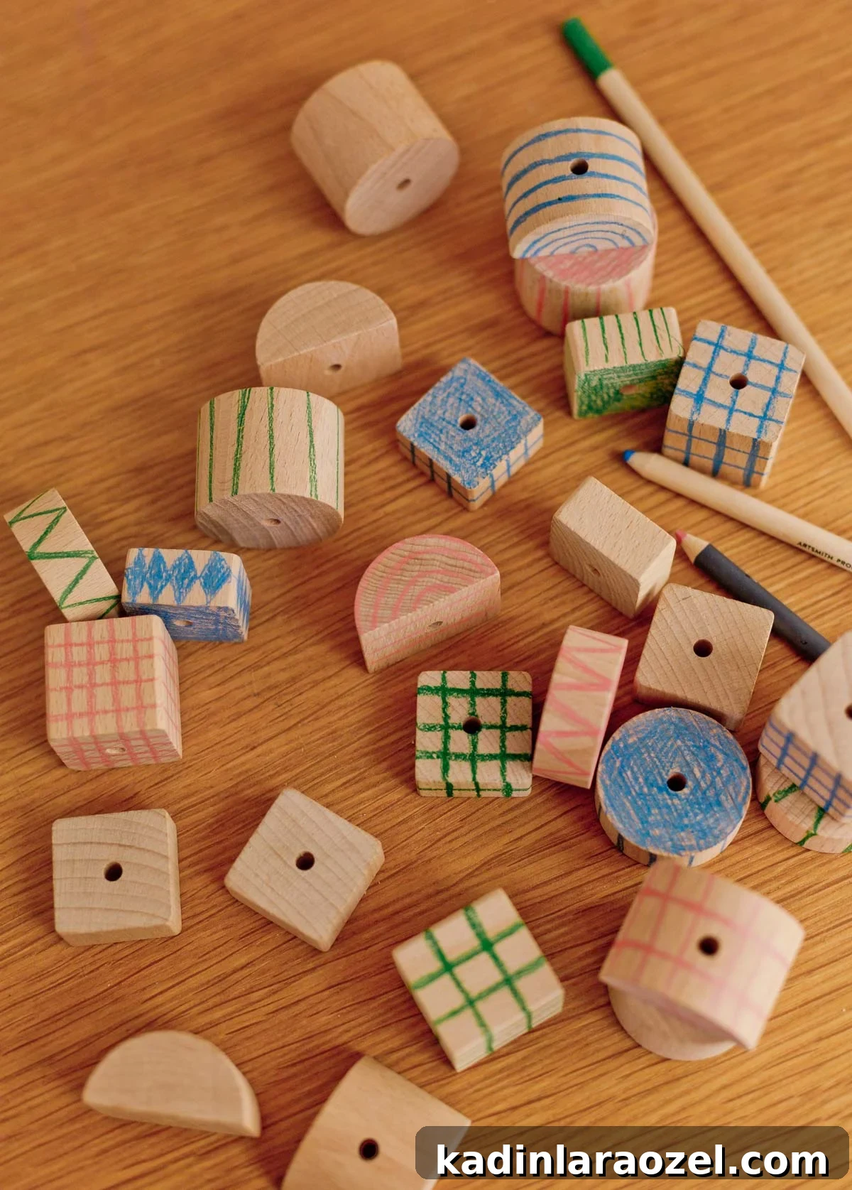 drawing patterns on chunky wood blocks with colored pencils
