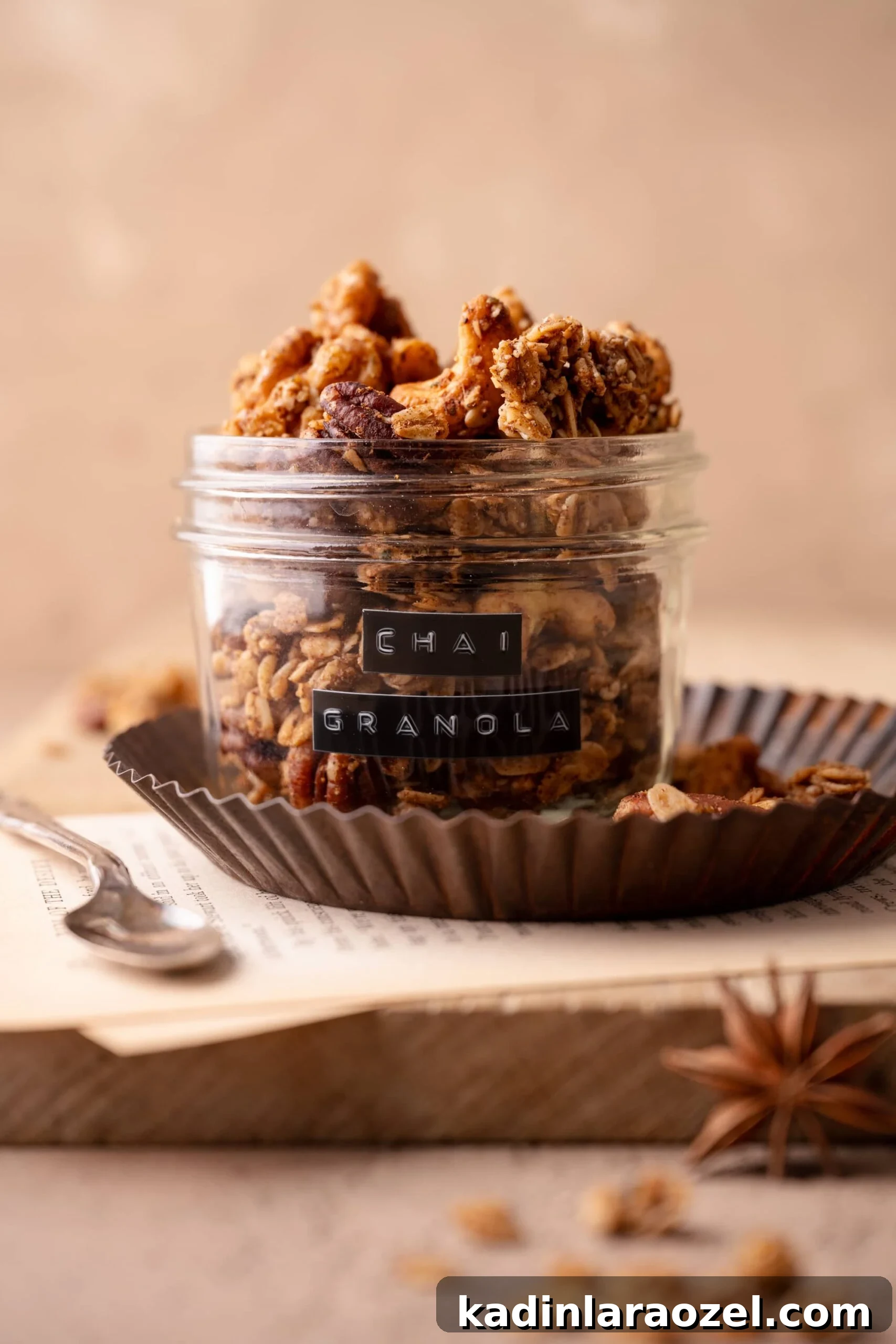chai granola in a small glass jar, with an old school embossed label