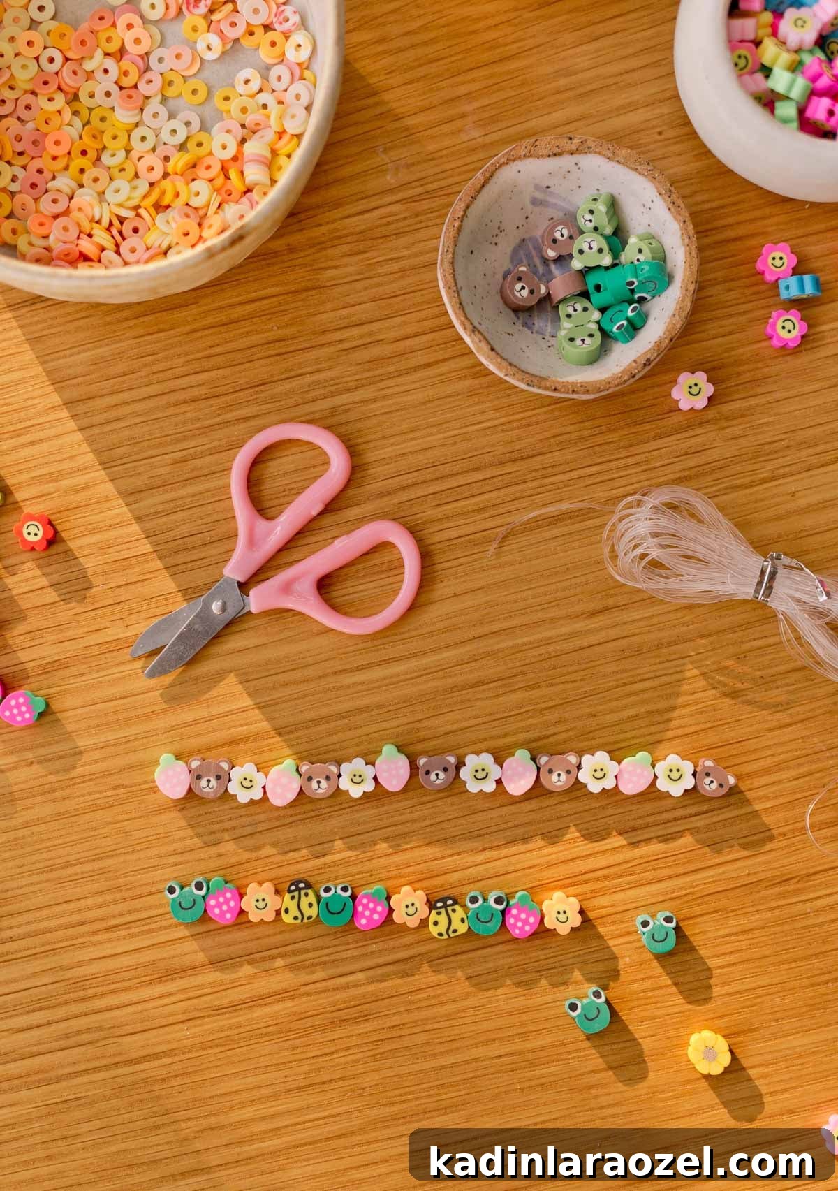 polymer clay beads being assembled into kids bracelets