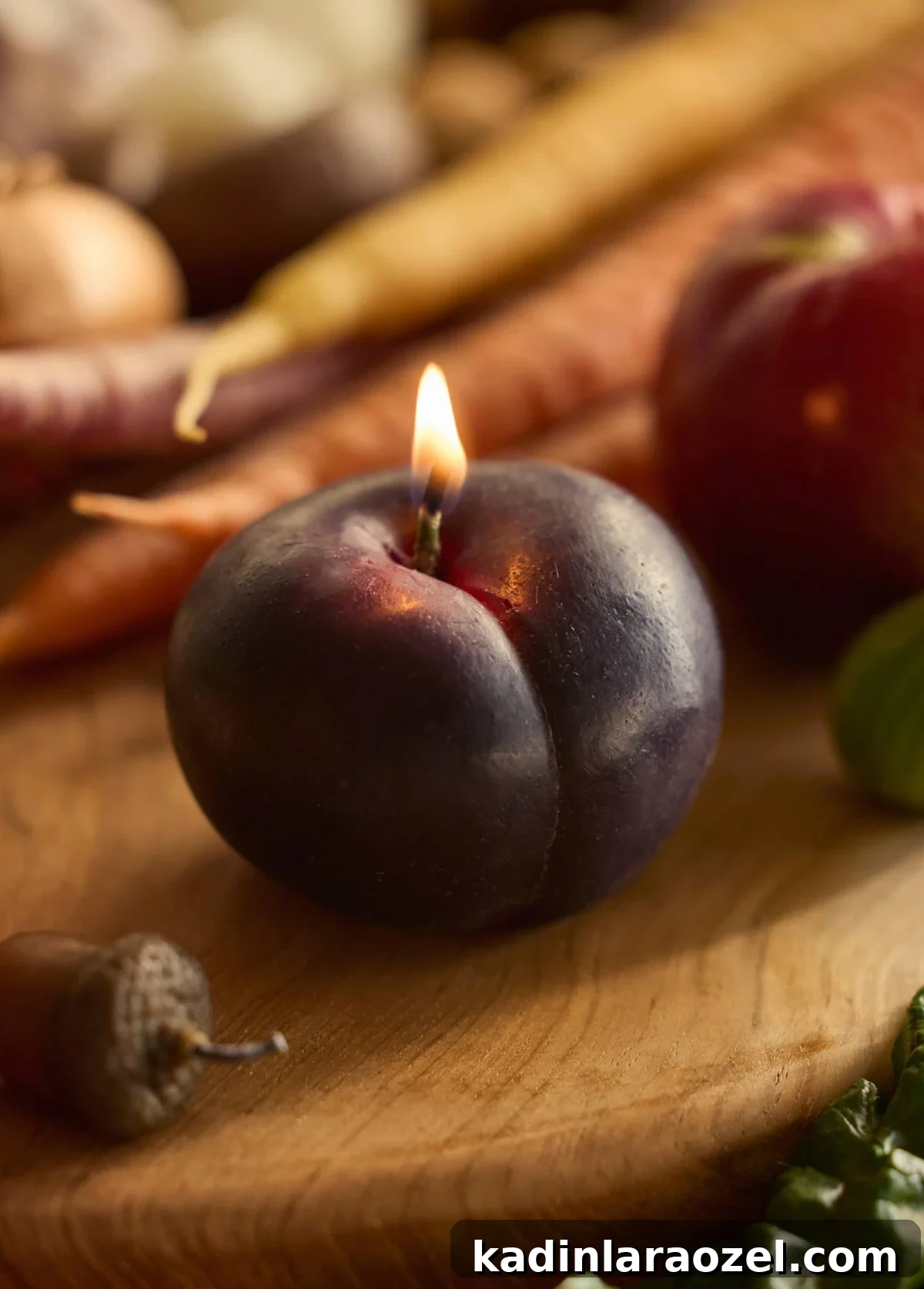 Effortless Thanksgiving Decorating Ideas 9 plum shaped candle that looks lifelike