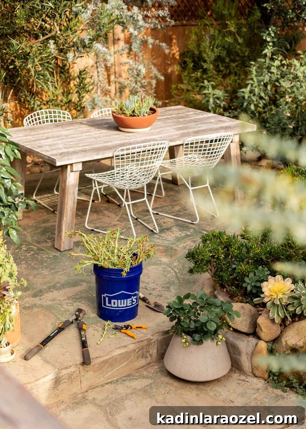 Practical Backyard Garden Ideas You Can Actually Build 3 outdoor dining table in a lush backyard