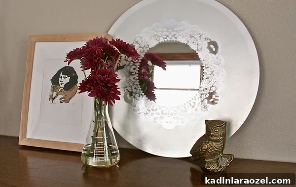 Learn how to make a frosted glass mirror with a doily design pattern.