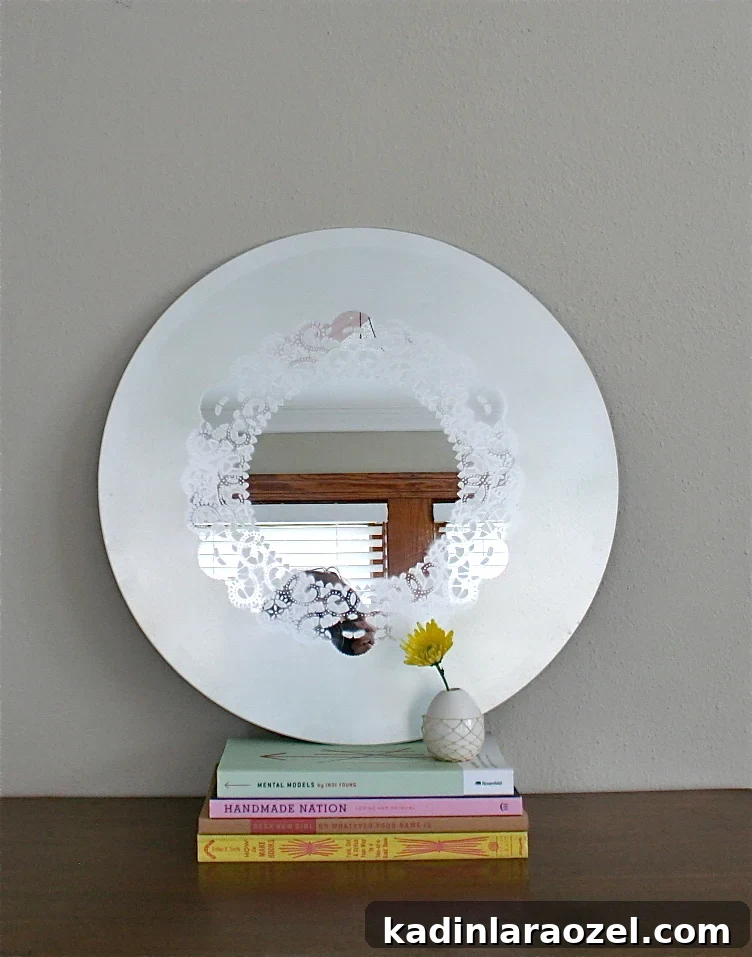 DIY Idea! Learn how to make a frosted glass mirror with a doily design pattern.