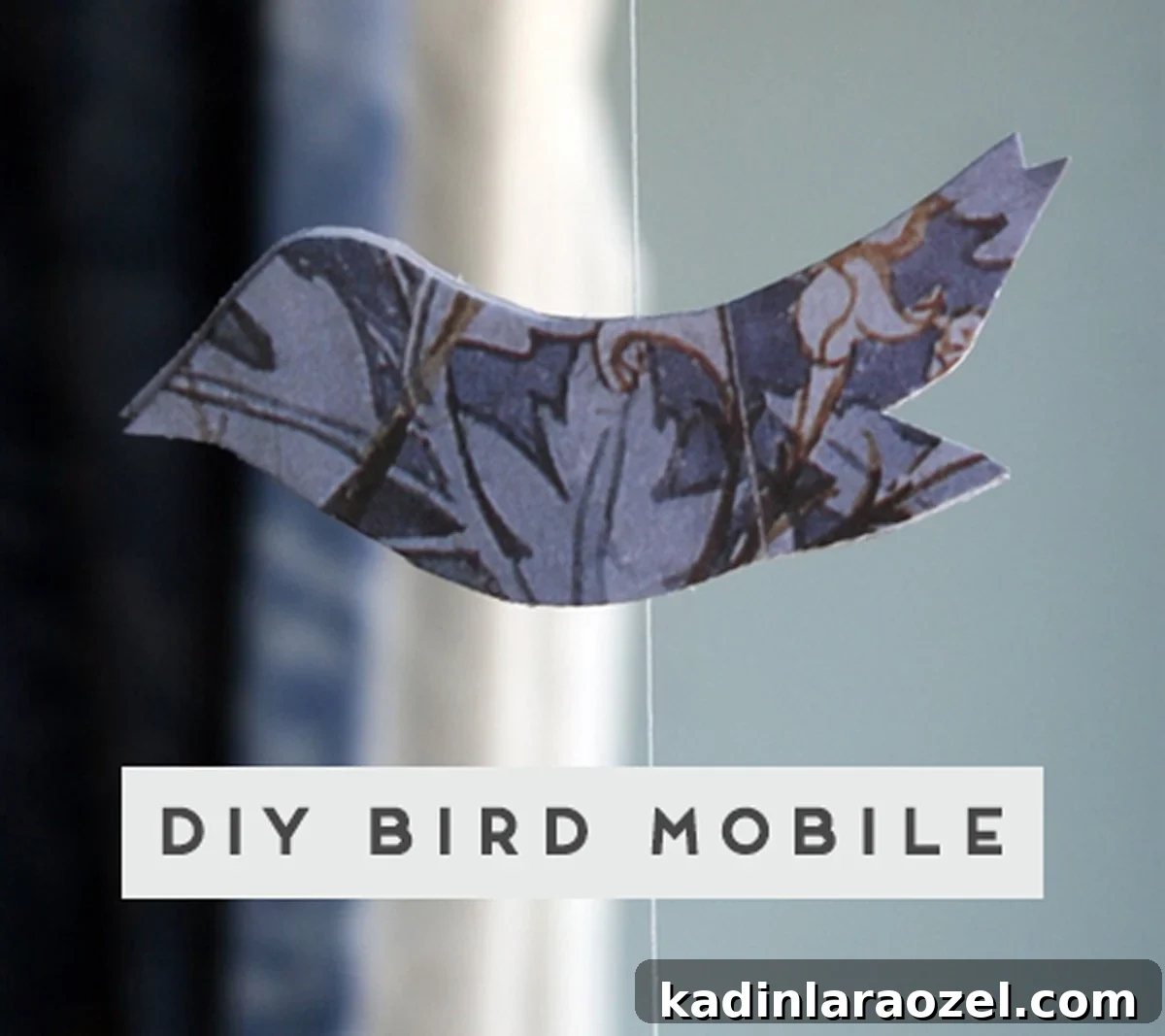 ps_diypapercloth Blue bird mobile made of scrap paper and string