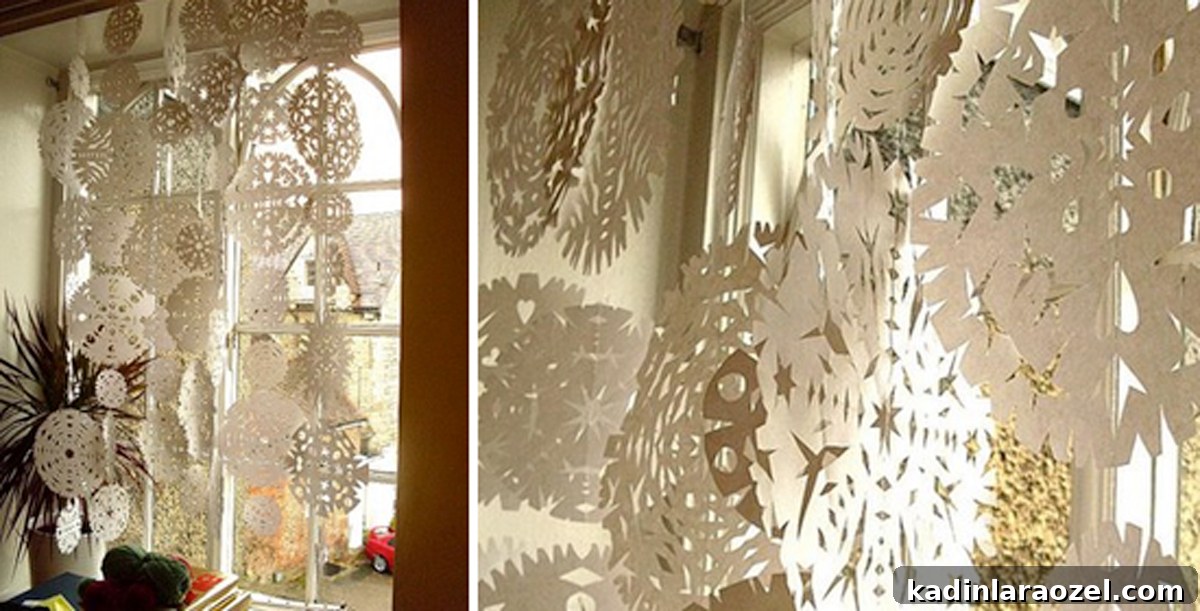 paper snowflake curtain diy Side by side of paper snowflakes covering a large window in a home