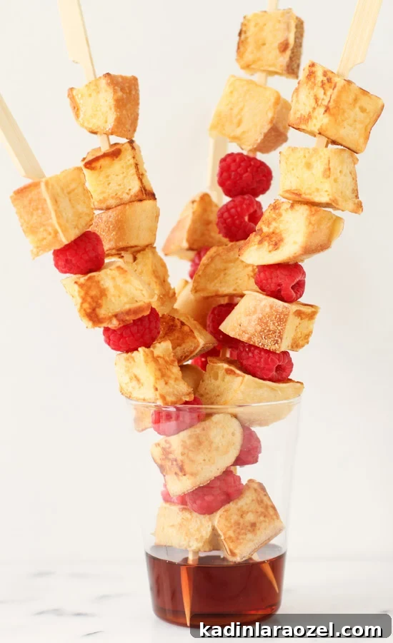 French Toast Kabobs: Sweet Breakfast Skewers with Fruit 4 French toast kabobs with syrup