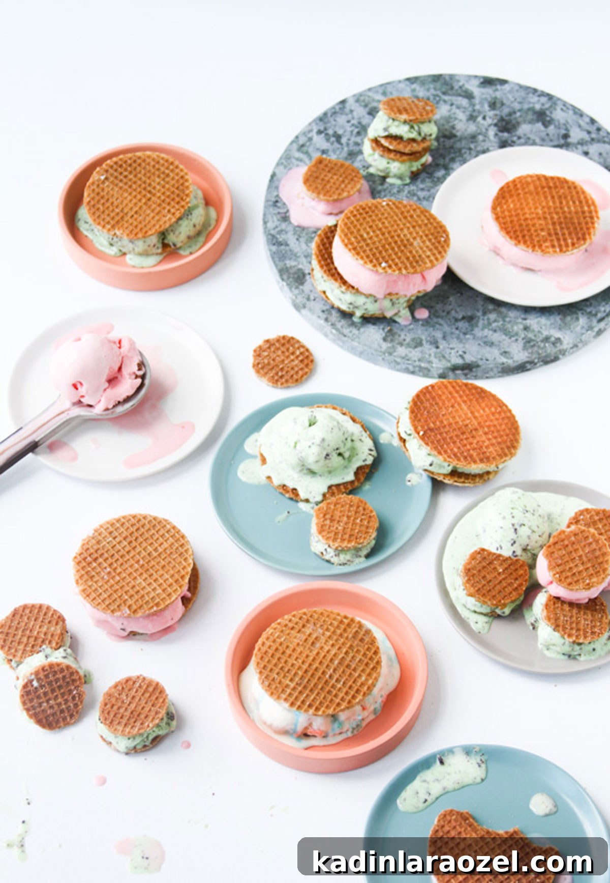 Stroopwafel Ice Cream Sandwich Recipe: Chewy Caramel Treats 4 Dutch waffle ice cream sandwiches on a table with melted ice cream