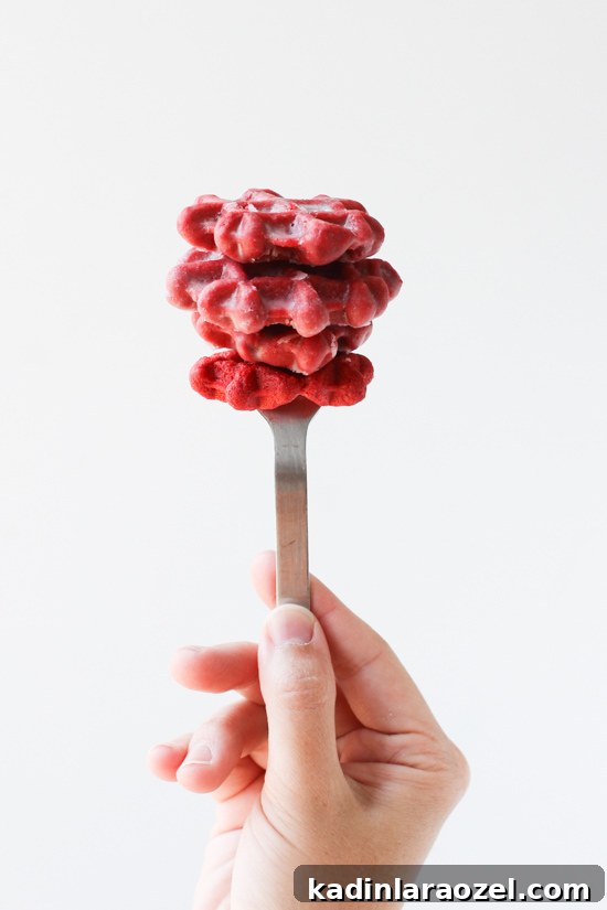 Homemade Red Velvet Waffles Dipped in a Donut Glaze