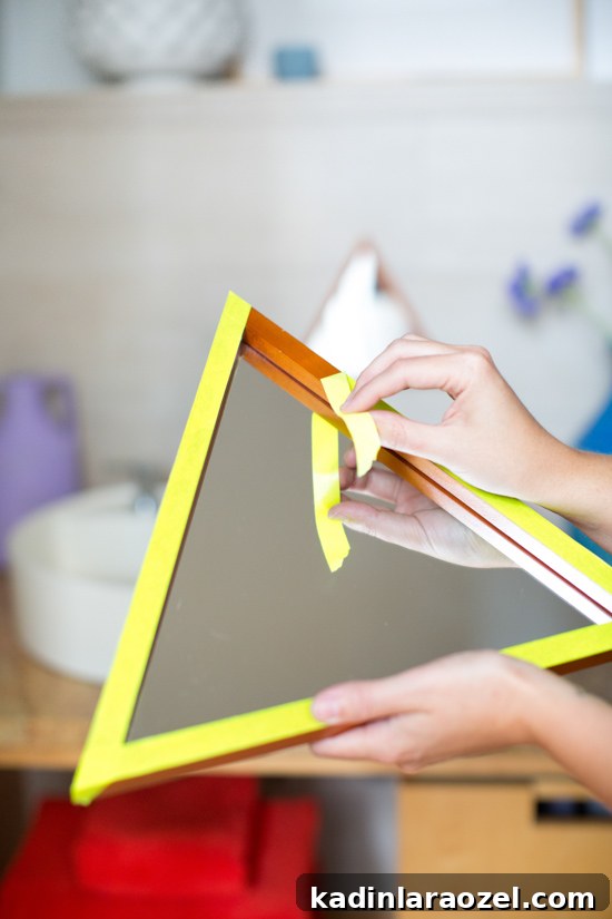 Guest Bathroom Makeover: How I Transformed It for $250 or Less 7 DIY mirror makeover with neon washi tape