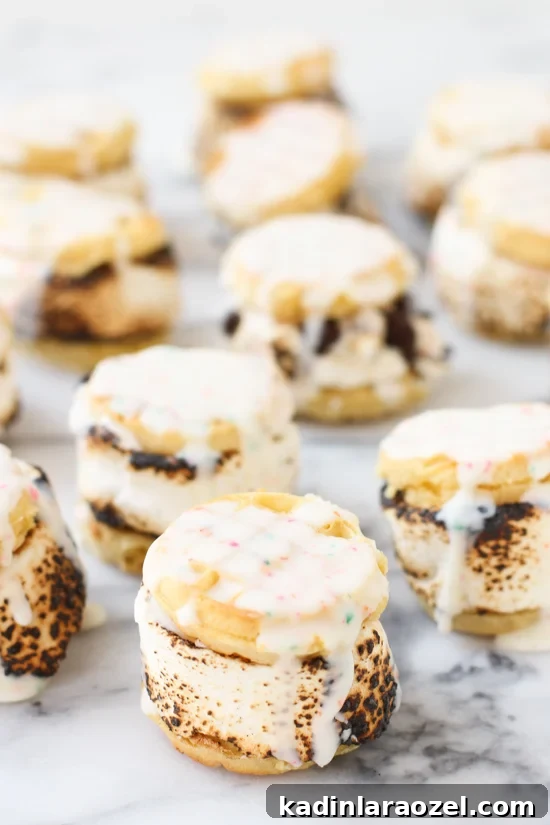 Weekend S'more Waffle Sandwiches: Gooey Chocolate & Marshmallow Treat 5 S'more waffle sandwiches drizzled with white chocolate magic shell