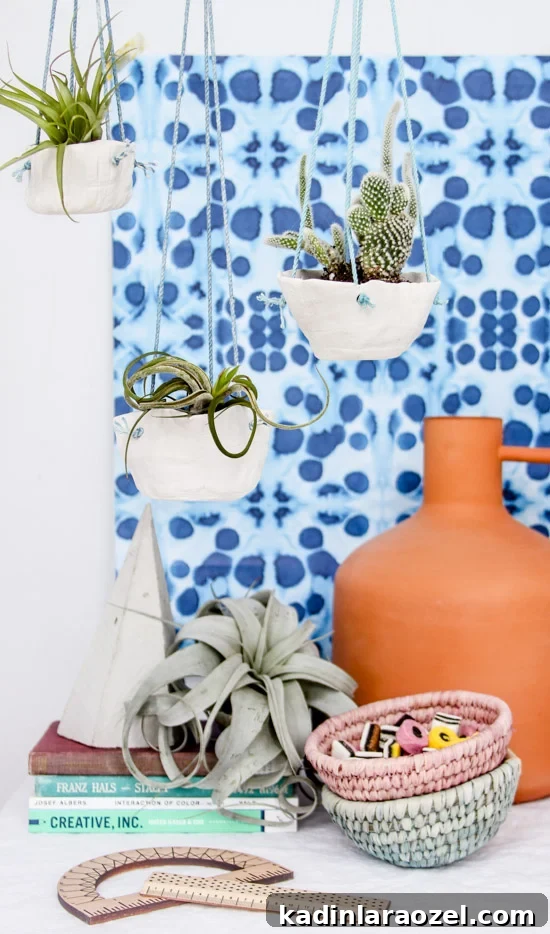 DIY Hanging Clay Planters: Step-by-Step Guide to Make Your Own 2 DIY hanging planters using air dry clay and a simple coiling technique. Click through for the full tutorial.
