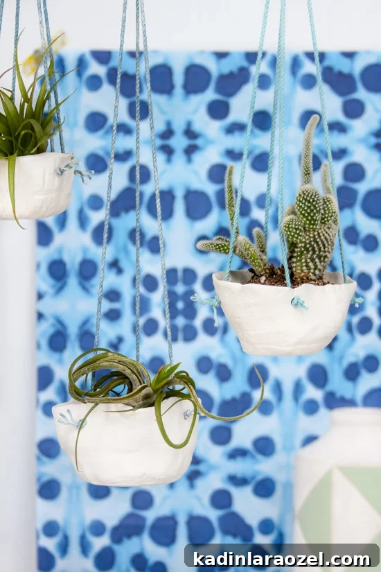 DIY Hanging Clay Planters: Step-by-Step Guide to Make Your Own 11 DIY hanging planters using air dry clay and a simple coiling technique. Click through for the full tutorial.