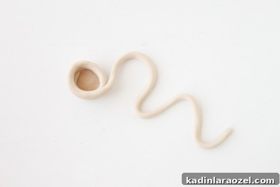 DIY Hanging Clay Planters: Step-by-Step Guide to Make Your Own 5 How to make DIY hanging planters using air dry clay and a simple coiling technique.