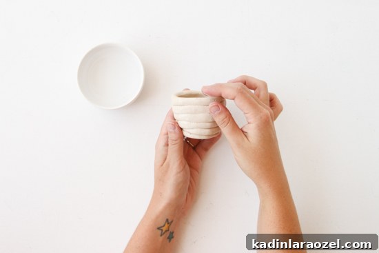 DIY Hanging Clay Planters: Step-by-Step Guide to Make Your Own 6 How to make DIY hanging planters using air dry clay and a simple coiling technique.