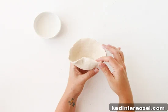 DIY Hanging Clay Planters: Step-by-Step Guide to Make Your Own 7 How to make DIY hanging planters using air dry clay and a simple coiling technique.