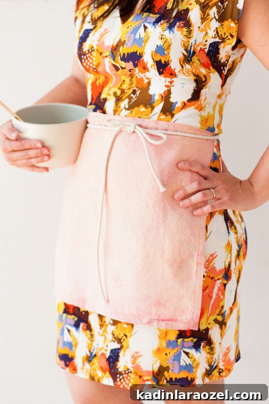Closeup image of handmade cafe apron, made of linen.