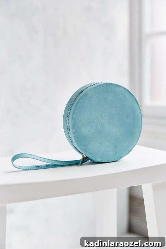 Fall Fashion: 11 Essential Bags You Need This Season 3 ice blue circle clutch