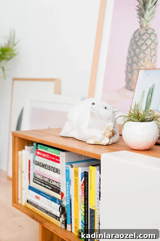 Quirky accessories and artwork in modern living room reveal