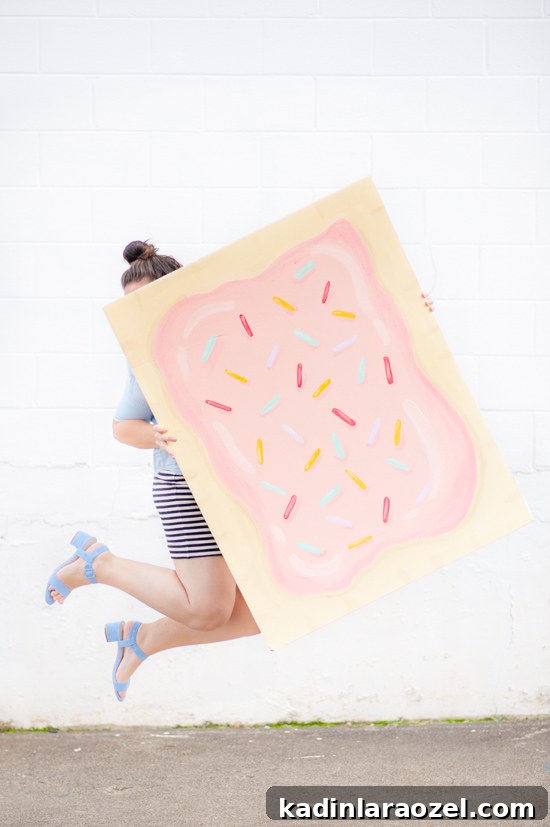 Girl jumping in air wearing a DIY pop tart costume
