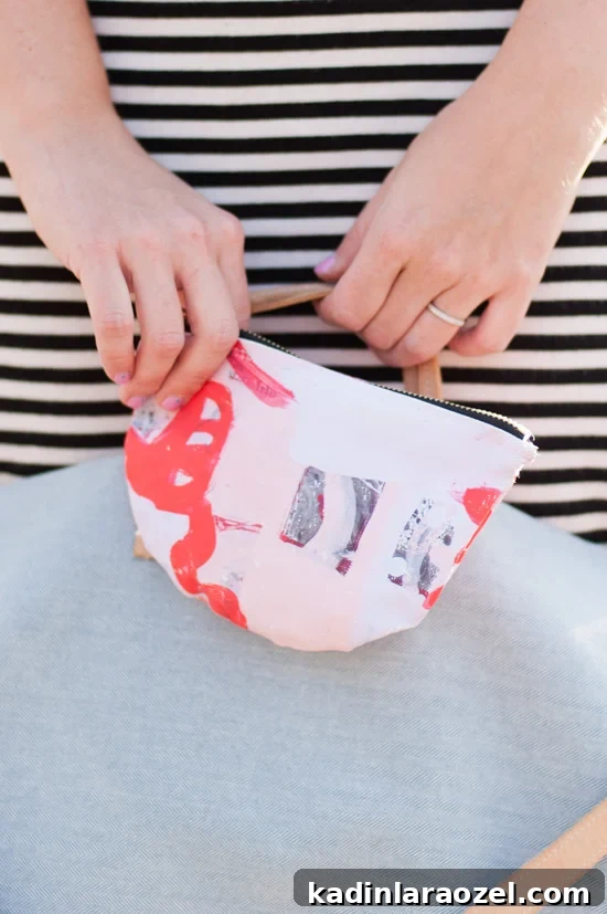 Turn your artwork into a DIY canvas clutch with this easy to follow tutorial