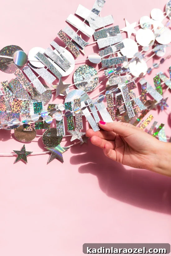 Holographic New Year’s Eve Garland and Photo Booth Backdrop DIY 3 Holographic New Year's Eve Garland DIY and Photo Booth Backdrop