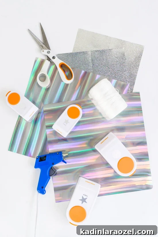 Holographic New Year’s Eve Garland and Photo Booth Backdrop DIY 4 How to Make a Holographic New Year's Eve Garland DIY that Doubles as a Photo Booth Backdrop