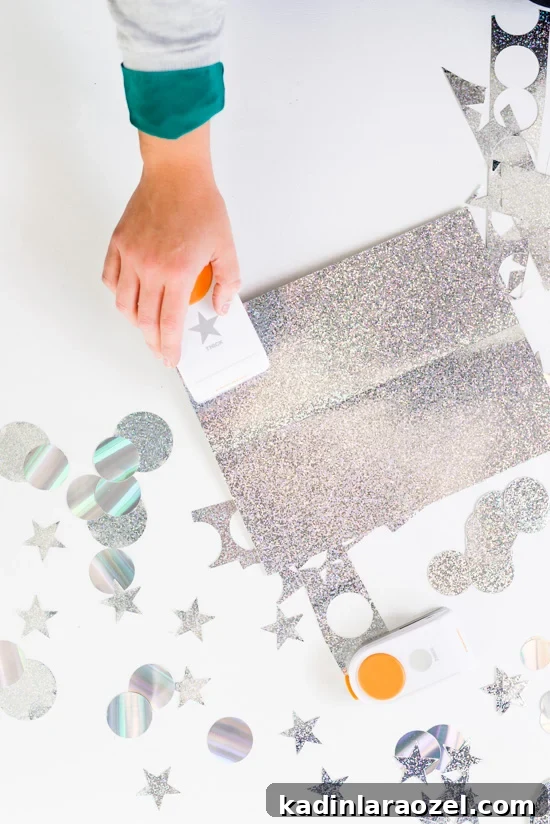 Holographic New Year’s Eve Garland and Photo Booth Backdrop DIY 5 How to Make a Holographic New Year's Eve Garland DIY that Doubles as a Photo Booth Backdrop
