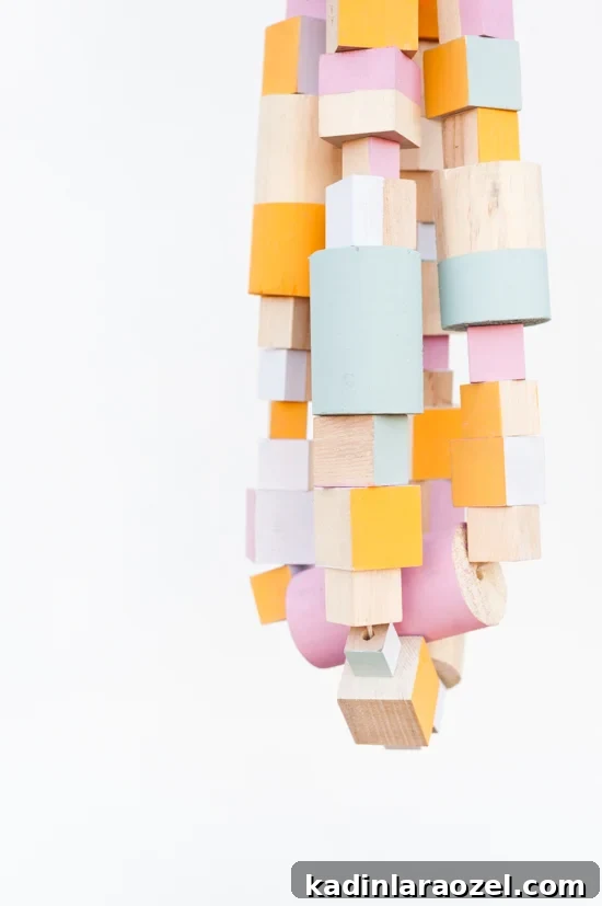 Oversized Wooden Block Garland DIY for Holiday and Year-Round Decor 2 Oversized wood block DIY garland idea