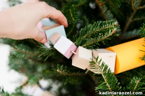 Oversized Wooden Block Garland DIY for Holiday and Year-Round Decor 11 Oversized wood block DIY garland idea