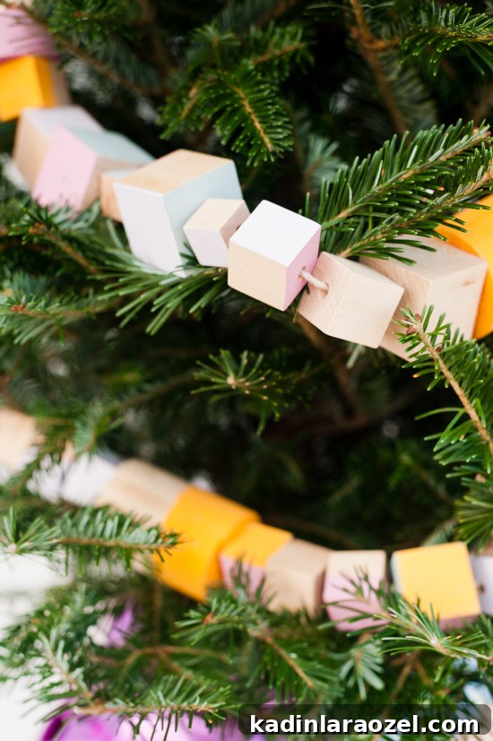 Oversized Wooden Block Garland DIY for Holiday and Year-Round Decor 16 Oversized wood block DIY garland idea