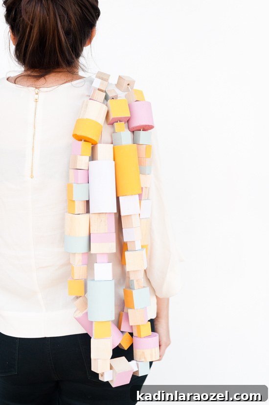 Oversized Wooden Block Garland DIY for Holiday and Year-Round Decor 3 Oversized wood block DIY garland idea