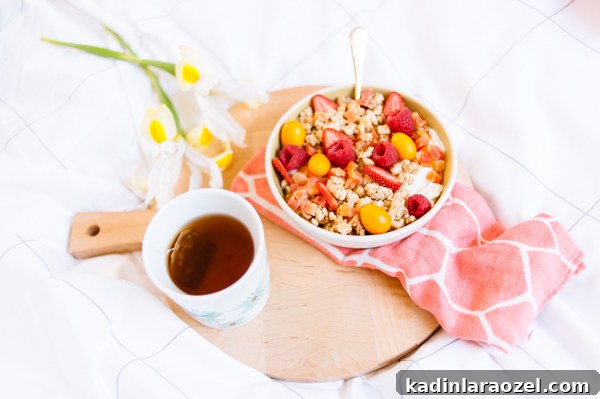 Yogurt and granola breakfast in bed