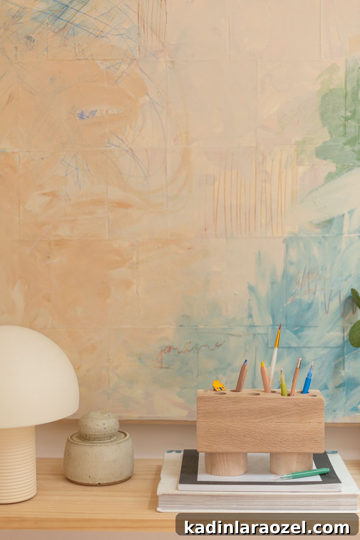 DIY Pencil Holder Makeover: Stylish Steps to Upcycle a Holder 12 Large abstract artwork on a small desk with mushroom lamp and wood pen holder